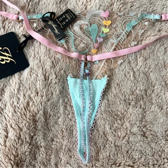 Honey Birdette Candy Blue Thong Panty Size XS
With back stone - Picture 7 of 8